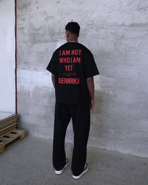 I AM NOT WHO I AM, YET. - MIDNIGHT BLACK